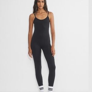 SOLD OUT Aritzia Golden BUTTER Essential Jumpsuit size Small